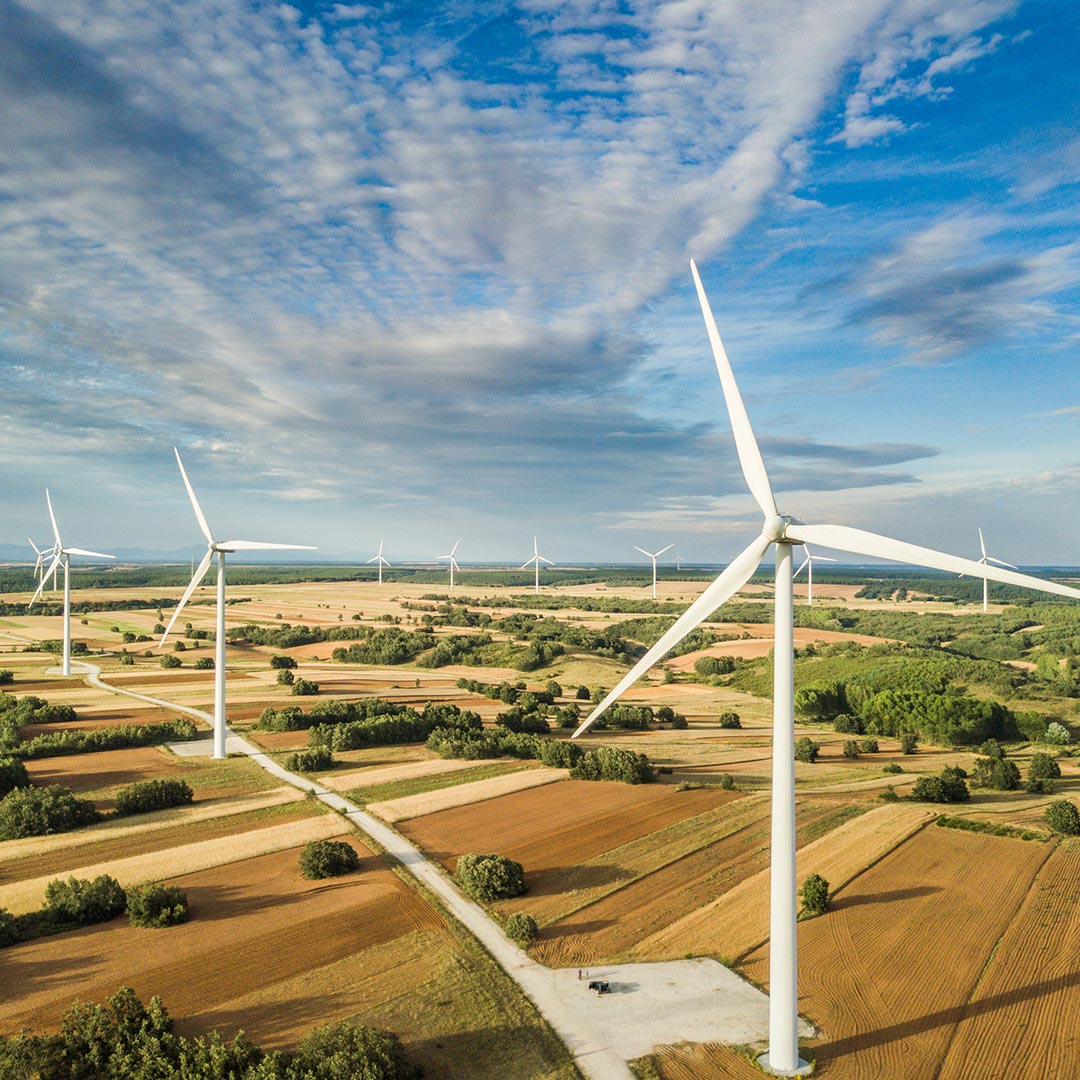 Wind turbines across country fields
